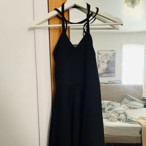 Backless plain black dress.